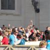 Our pilgrims wave with excitement as they wait for Pope Francis to come out!